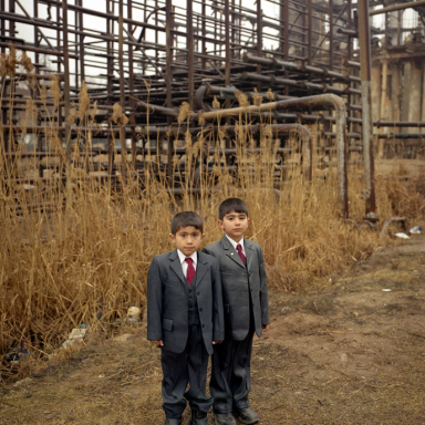 © Rena Effendi, School boys in a refugee settlement at the abandoned gas